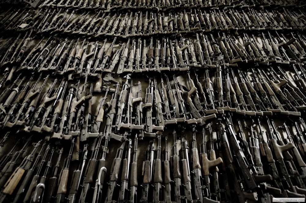 0108_zoriah-photojournalist-war-photographer_zoriah_photojournalist_photographer_guns_ak_47_weapons_cache_confiscated_iraq_irak_war_conflict