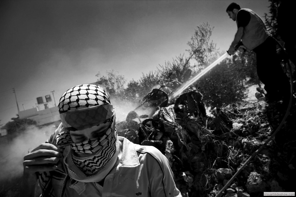 0125_zoriah-photojournalist-war-photographer_zoriah_photojournalist_photographer_west_bank_palestine_palestinians_protest_israel_wall_fire